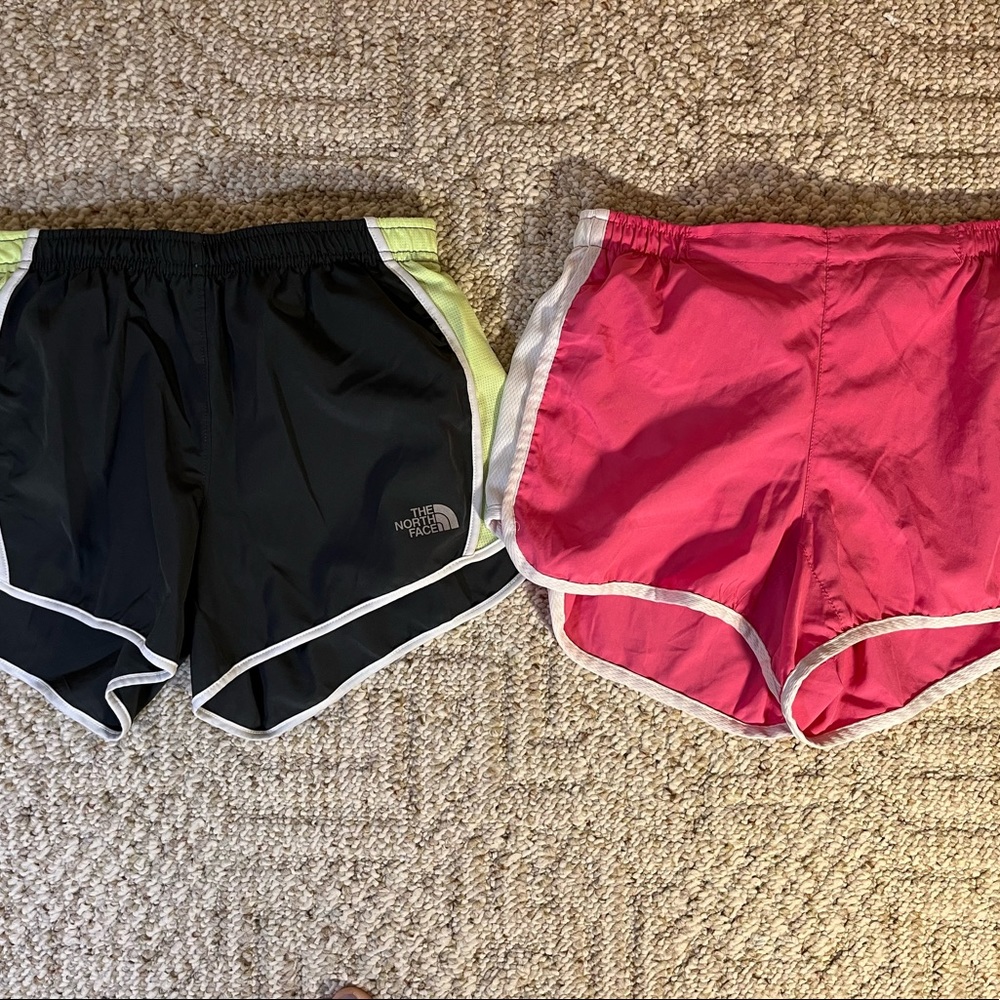 Two pairs of Small Running Shorts grey North Face & pink Puma